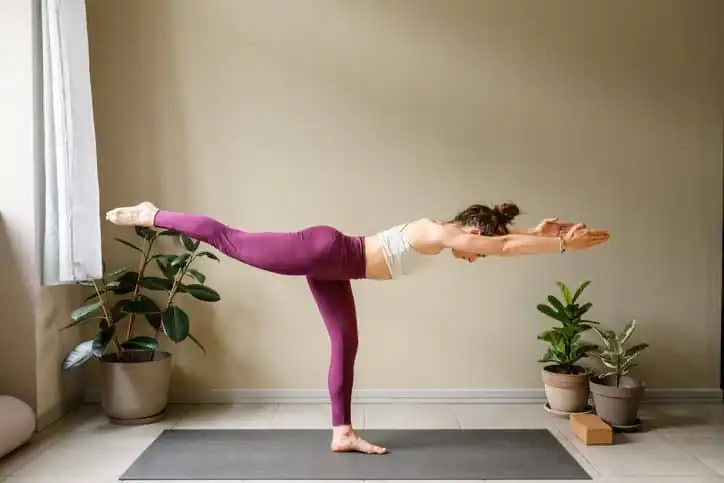 Achieving the Perfect Tone: How Often Should You Exercise for Results? 1 Woman doing Yoga exercise East Bridgford to help with toning the body.